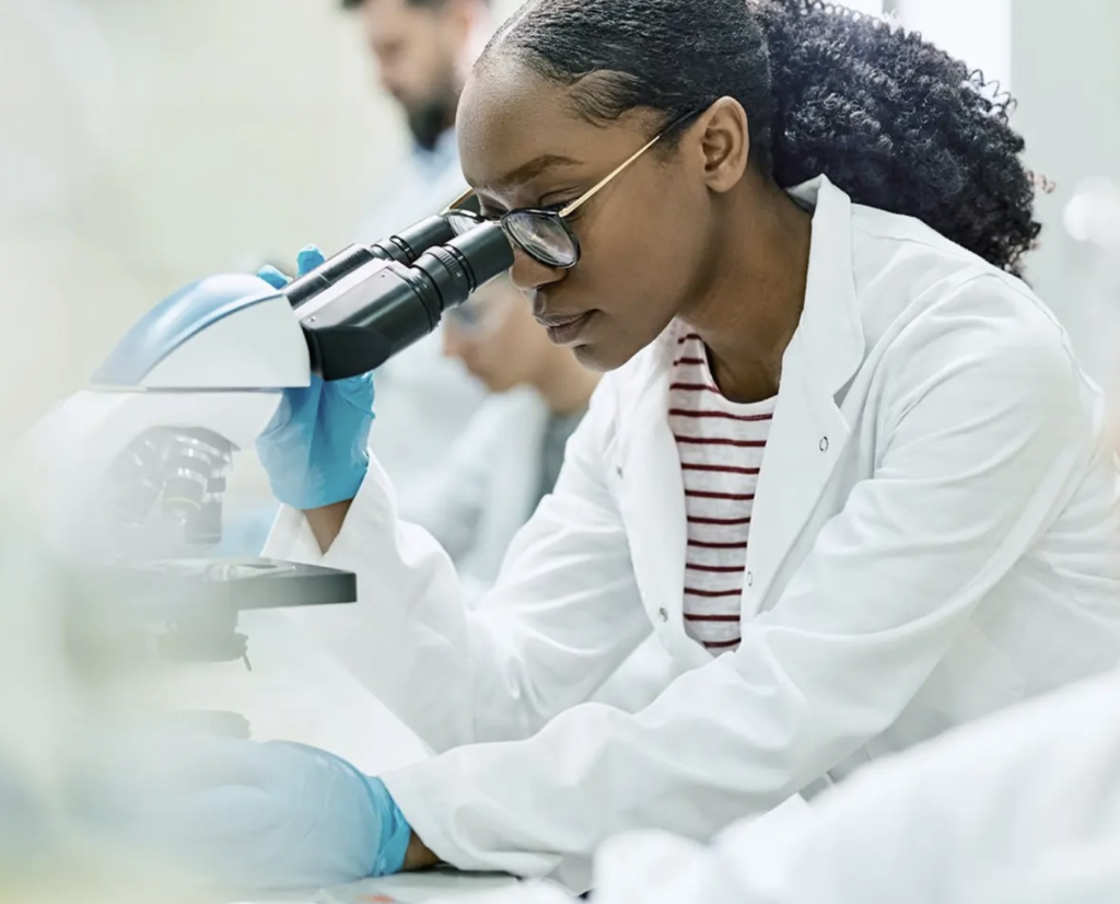 scientist looking at a sample